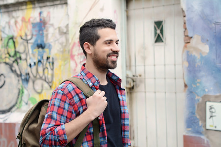 Portrait of young latin man. Urban scene.の写真素材