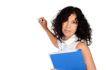 Portrait of beautiful school teacher writing with marker. Education concept. Isolated white...