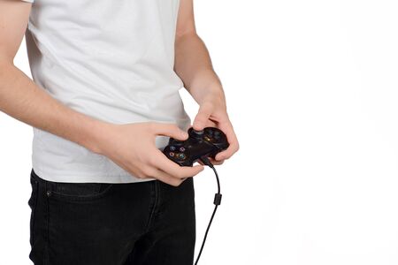 Portrait of young man playing videogames. Isolated white background.