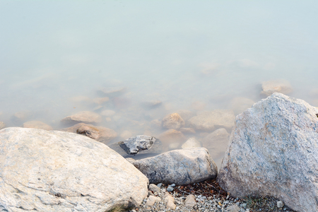 Close-up of the Emerald lake (Laguna esmeralda) in Ushuaia, Tierra del Fuego, Argentina.の写真素材
