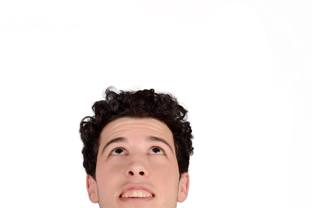 Close up of young latin man. Isolated white background.の写真素材