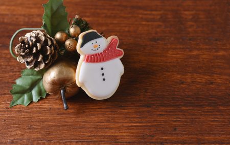 Snowman cookie with festive decoration. Christmas conceptの写真素材