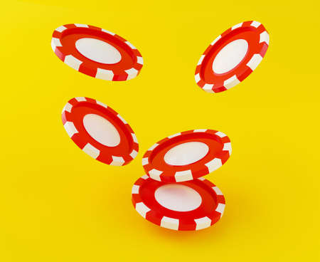 3d illustration. Big pile of red casino chips on yellow background. Casino concept.