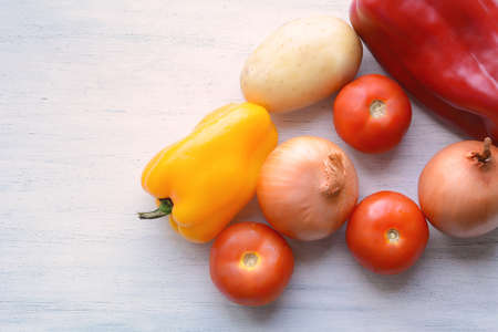 Fresh vegetables on white wood background. healthy concept