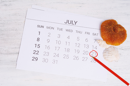 Summer Calendar Schedule with summer beach accessories. Holiday concept.の写真素材