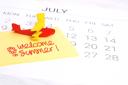 Summer Calendar Schedule, with toy airplane. Travel, tourism, holiday concept.の写真素材