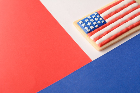 Patriotic cookie for 4th of July on background of American flag colors. Independence day conceptの写真素材