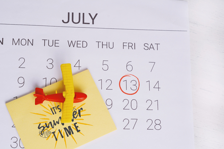 Summer Calendar Schedule, with toy airplane. Travel, tourism, holiday concept.の写真素材