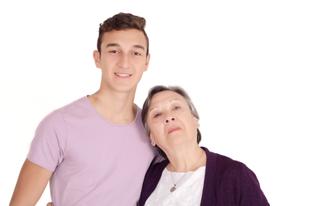 Grandmother with her teen grandson. Family concept. Isolated white backgroundの写真素材