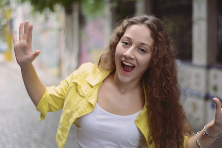 Portrait of a young beautiful woman in the street. Outdoors.の写真素材