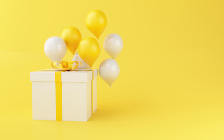 3d illustration. Balloons and gift box on yellow background. Minimal and Birthday party concept.の写真素材