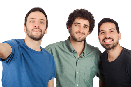 Group of three friends taking a selfie on studio.の写真素材
