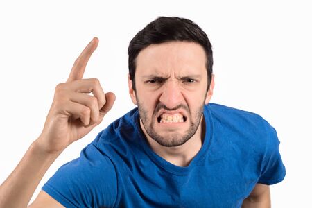 Portrait of young man who is angry with someone.の写真素材