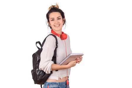 Portrait of attractive young latin woman in a studio. Isolated white background.の写真素材