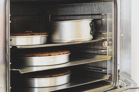 Close-up of a cakes baking in the oven. Cooking concept.の写真素材