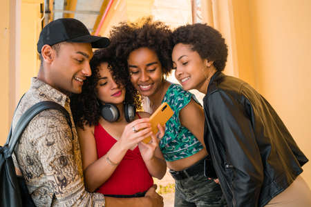 Afro friends having in the city.
