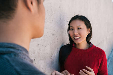 Asian couple having a conversation.の写真素材