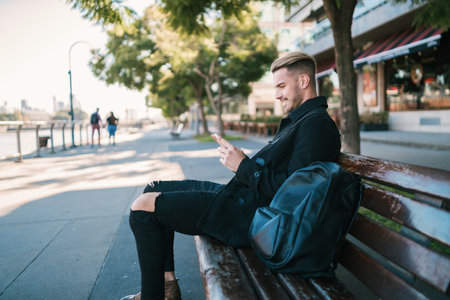 Man using his mobile phone.の写真素材