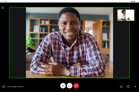 Business man on a work video call from home.の写真素材