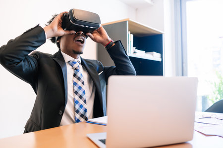 Businessman using virtual reality headset