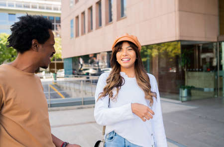 Young couple spending time together outdoors.