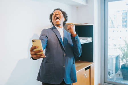 Businessman on a video call with phone.の写真素材