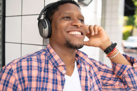 Man listening music with headphones.の写真素材