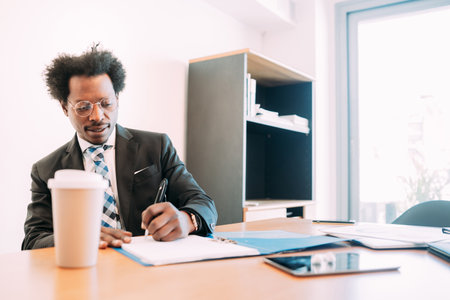 Businessman working with some files at office.の写真素材