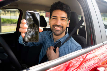 Man showing something on screen phone.