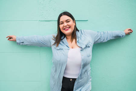 Portrait of young plus size woman.の写真素材