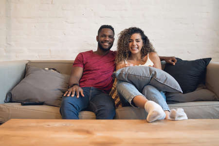 Young couple spending good time together at home.