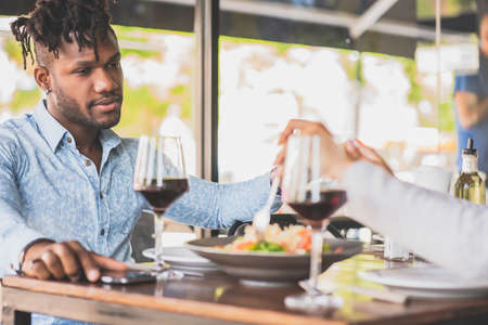 Couple having a date at a restaurant.の写真素材
