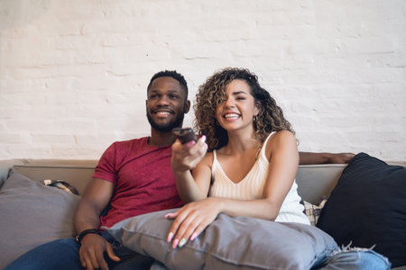 Young couple spending good time together at home.