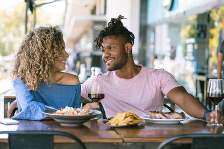 Couple having a date lunch at a restaurant.の写真素材