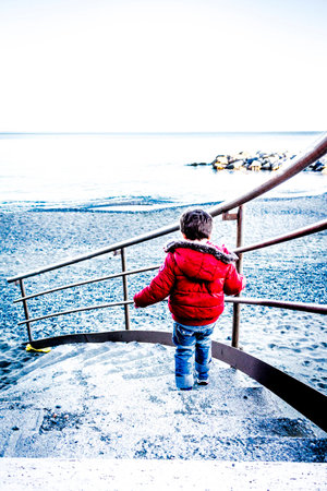 child Descending a Staircaseの写真素材