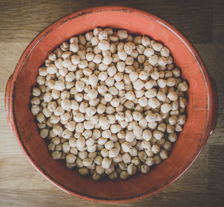 red dish full of chickpeas, view fro aboveの写真素材