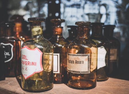 Rimini, Italy, march 17 2018 lots of old pharmacy glass bottles are on shelf, vintage lookのeditorial素材