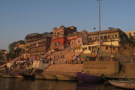 Varanasi, Uttar Pradesh India - March 25, 2017, ritual with pilgrims bathing in the Ganges riverのeditorial素材