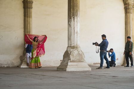 Agra, Uttar Pradesh India - March 23, 2017, young wedding couple on photo shoot in red fort in Agra