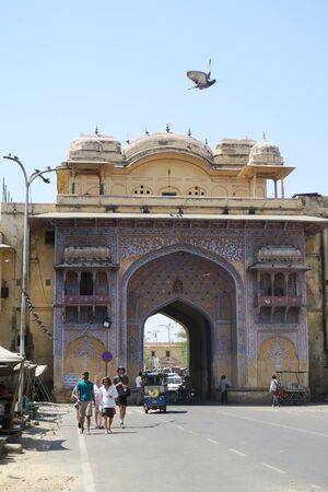 Jaipur, India - 20 march 2017, Gate in Jaipur with Tuktuk and peopleのeditorial素材