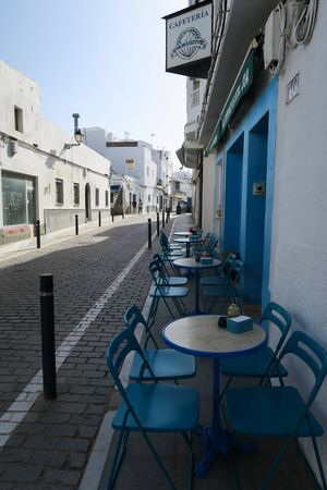 Conil de la Frontera - AndalucÃ­a - 2017 April 22: Small restaurant on a quiet street in Europeのeditorial素材