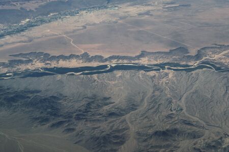 Beautiful view during the flight over lake powell and dry sand stone desert national parks in the USAの写真素材