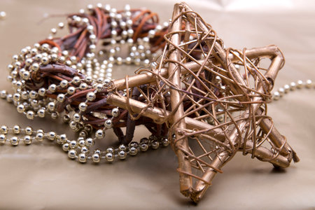 Gold Christmas star with golden beadsの写真素材