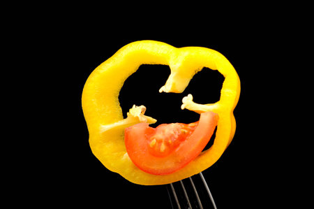 slice of yellow bell pepper on a fork