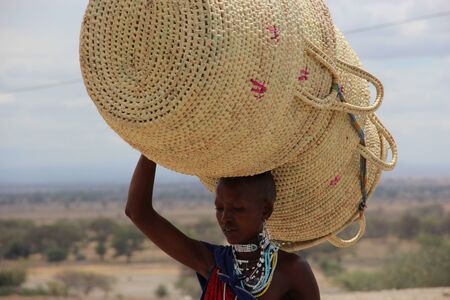 african woman is working in the villageのeditorial素材