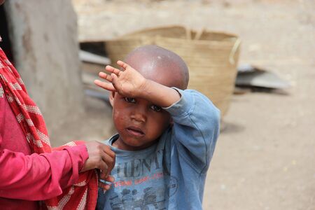 Child very shy in his villageのeditorial素材