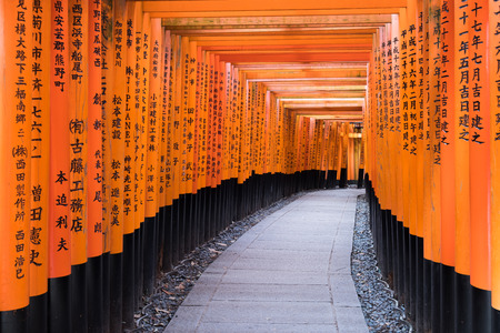 Red Torii gates in Fushimi Inari shrine in Kyoto, Japanのeditorial素材