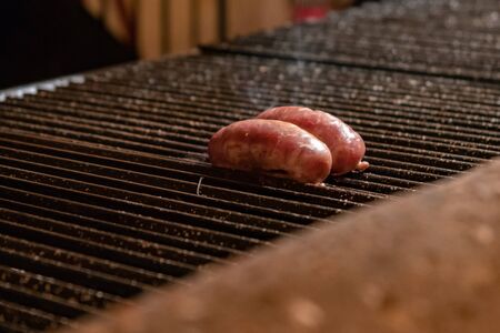 Barbecue with two chorizos for choripan Argentinian Foodの写真素材