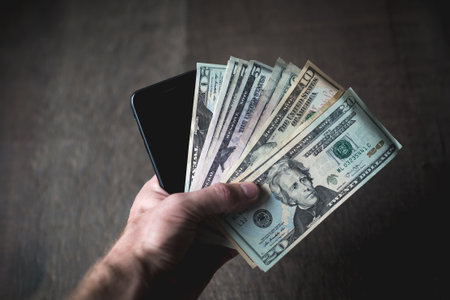 cash smartphoneの写真素材