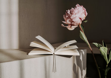 Diary with a pink peonyの写真素材